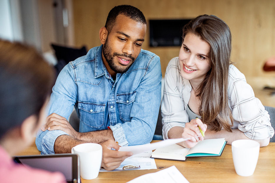 A couple reviewing documents.